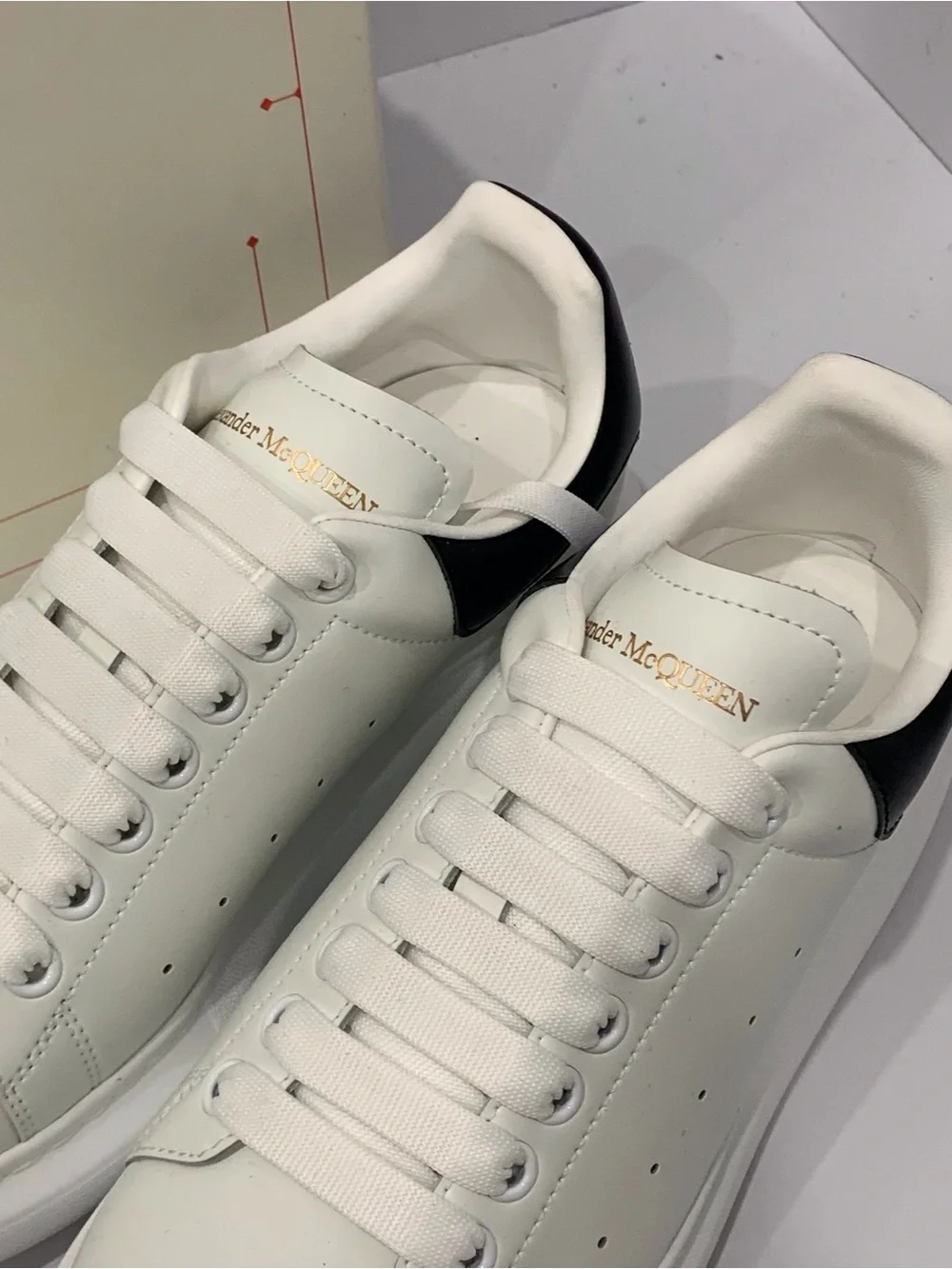 Alexander McQueen White Leather Sneakers with Black Heel Tab
